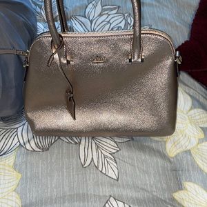 Kate spade rose gold purse
